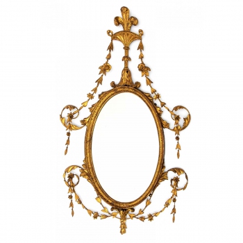 An important pair of George III carved giltwood mirrors