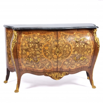 Een Hollandse palissanderhouten, rozenhouten, wortelnotenhouten en vruchtenhouten en marqueterie commode