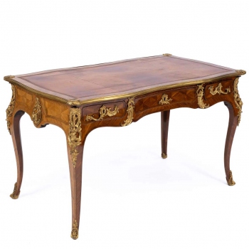 A Louis XV ormolu-mounted tulipwood and bois satiné parquetry bureau plat